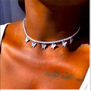 Hi bye my butter fly necklace it is silver